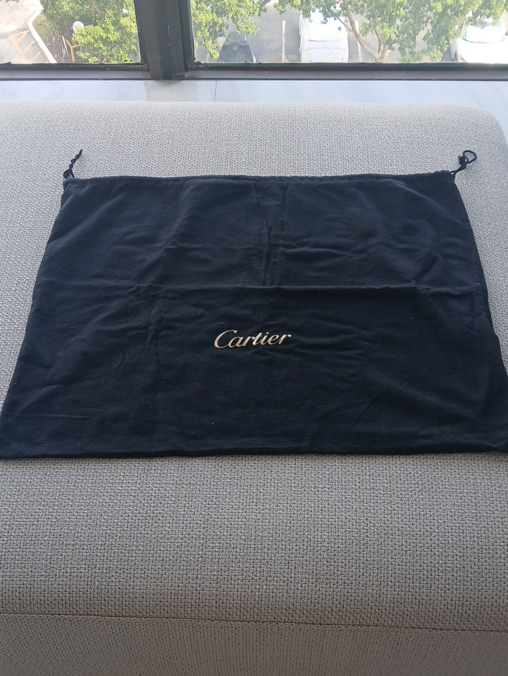 Cartier Black Drawstring Dust Pouch with Gold Logo for bag.